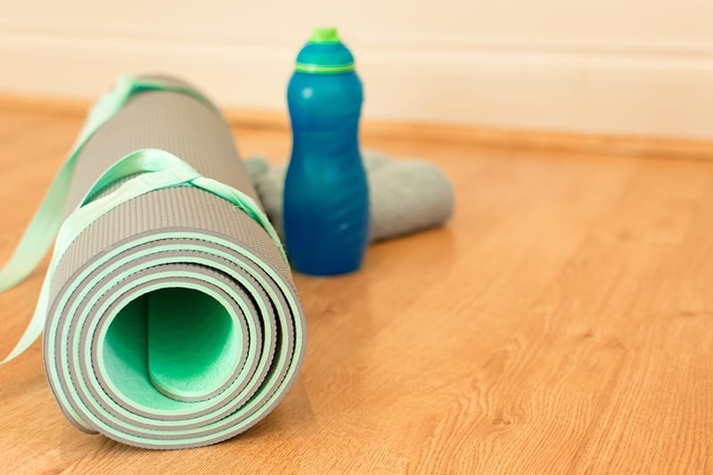 Yoga mat and water bottle.