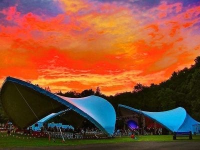 Outdoor concert venue at sunset