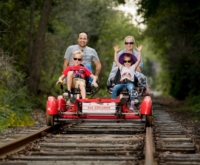 Family on Rail Explorers vehicle
