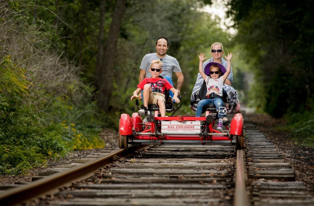 Family on Rail Explorers vehicle