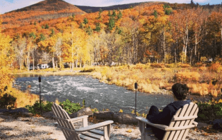 Picture of man enjoying Catskills fall foliage.