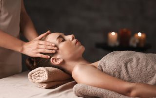 A woman getting a massage at a Catskills spa resort.