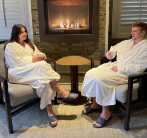 A couple at the spa on their Upstate New York winter vacation.